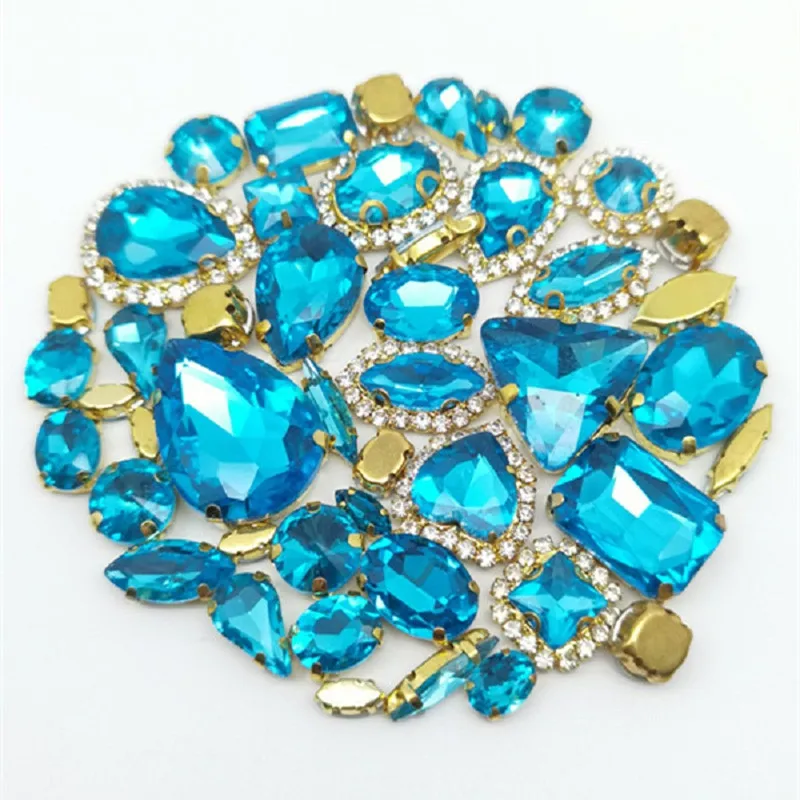 50pcs/Bag Shiny Mixed Lake Blue Shape Sew on Glass Rhinestone Gold Claw Crystal Buckle Diy Wedding Decoration Accessories
50pcs/Bag Shiny Mixed Lake Blue Shape Sew on Glass Rhinestone Gold Claw Crystal Buckle Diy Wedding Decoration Accessories