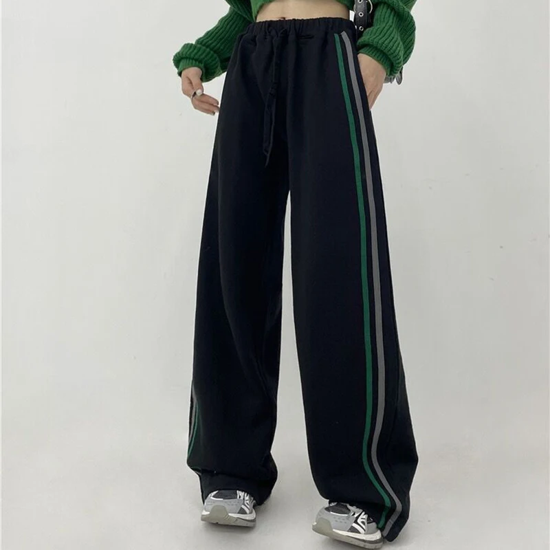 Female Black Stripe Casual Pants Vintage Korean High Waist Loose Straight Wide Leg Trousers Fashion Streetwear Jogging Pants
Female Black Stripe Casual Pants Vintage Korean High Waist Loose Straight Wide Leg Trousers Fashion Streetwear Jogging Pants