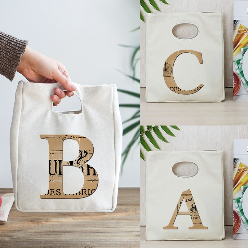 Golden Letters Print Thermal Insulated Lunch Bag Print Canvas HandBag Reusable Office Picnic School Food Storage Pouch Tote
Golden Letters Print Thermal Insulated Lunch Bag Print Canvas HandBag Reusable Office Picnic School Food Storage Pouch Tote
