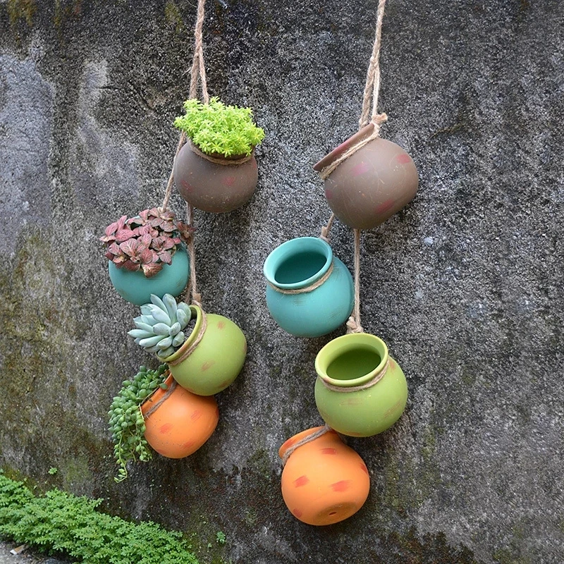 Ceramic 4 pcs Mini Hanging Flowerpot Wall Decoration Succulent Cactus Container Outdoor Garden Courtyard Decor Accessories 
Ceramic 4 pcs Mini Hanging Flowerpot Wall Decoration Succulent Cactus Container Outdoor Garden Courtyard Decor Accessories