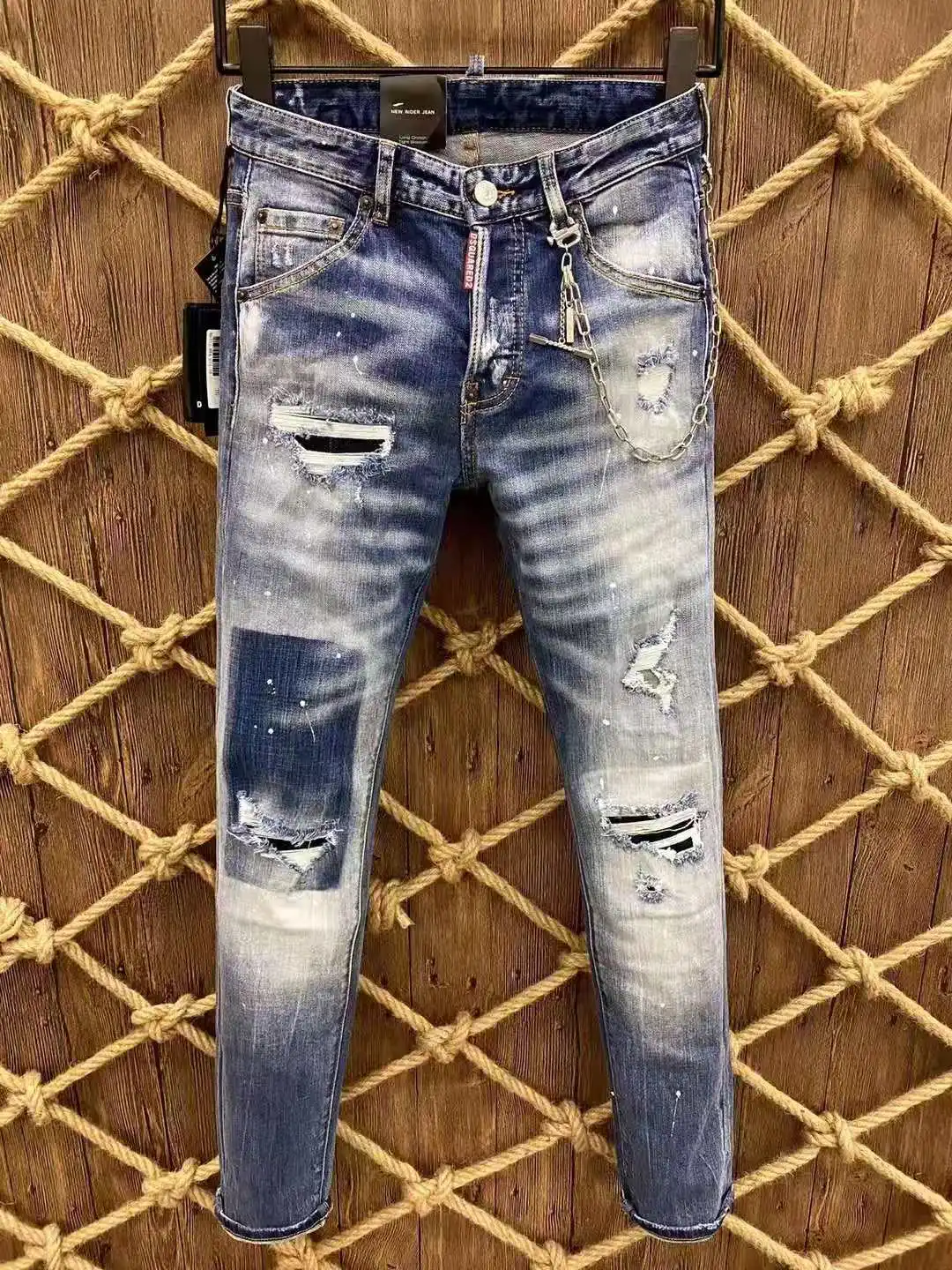 DSQUARED2 New Men's Skinny Jeans With Ripped Holes And Elastic Paint Spray Beggar Pants 9815
DSQUARED2 New Men's Skinny Jeans With Ripped Holes And Elastic Paint Spray Beggar Pants 9815