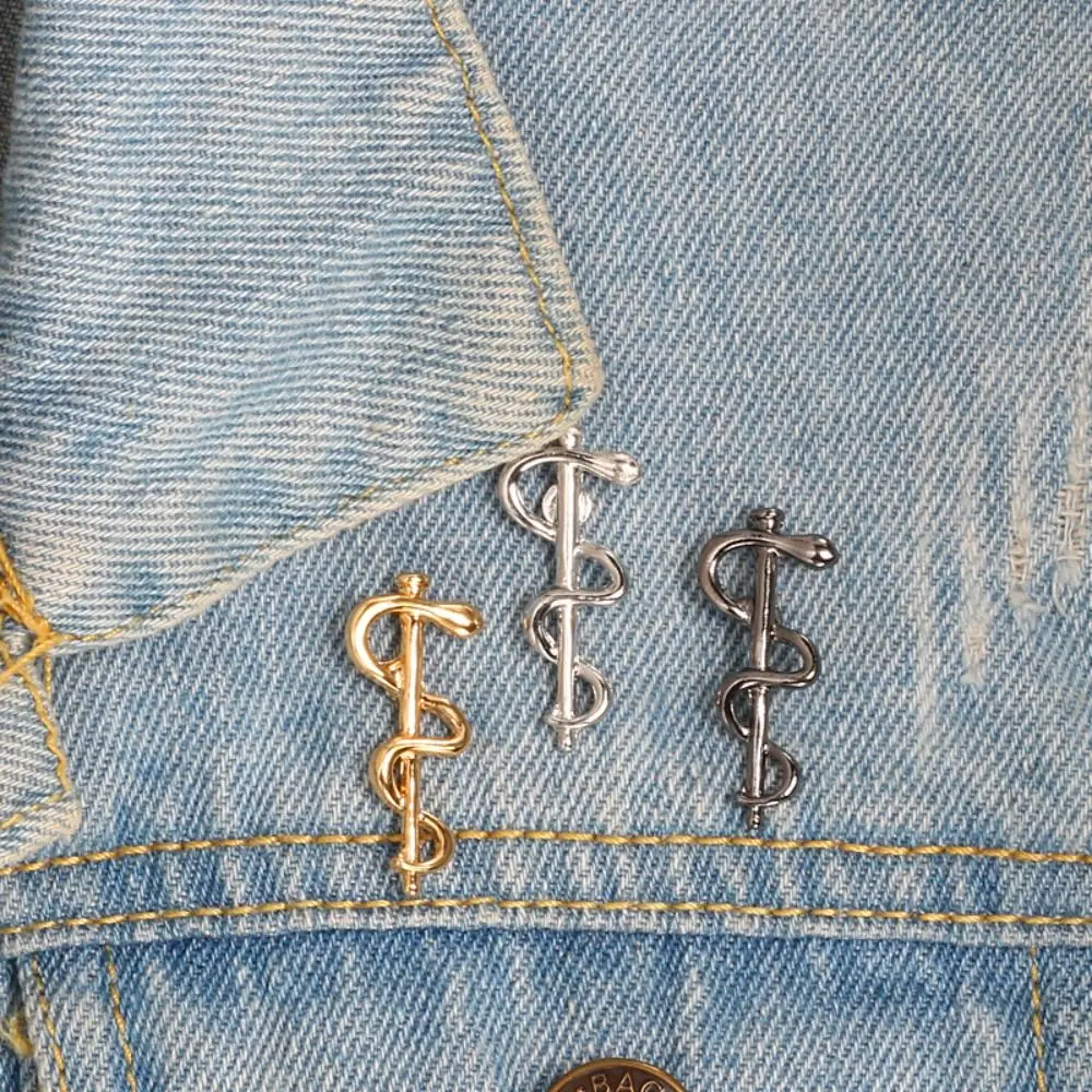 Magic Snake Stick Brooch Black/Gold/Silver Color World Health Organization Pin Metal Badge for Doctor Nurse Lapel Friend Jewelry
Magic Snake Stick Brooch Black/Gold/Silver Color World Health Organization Pin Metal Badge for Doctor Nurse Lapel Friend Jewelry