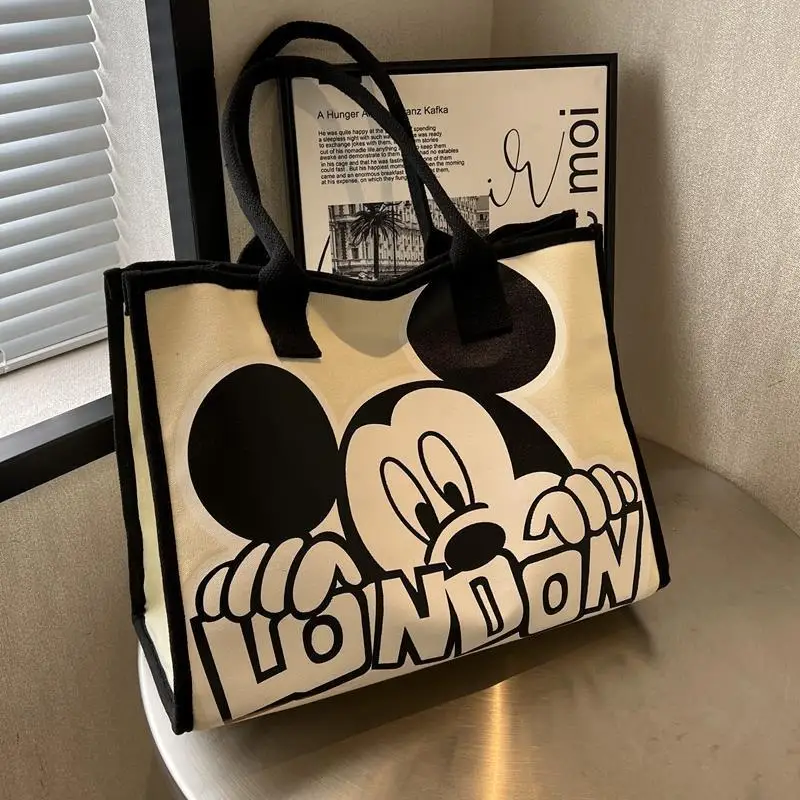 Disney Mickey Mouse Canvas Bag Anime Kawaii Versatile Shoulder Bag Commuter Tote Bag Large Capacity Baoma Handbag Children Gift
Disney Mickey Mouse Canvas Bag Anime Kawaii Versatile Shoulder Bag Commuter Tote Bag Large Capacity Baoma Handbag Children Gift