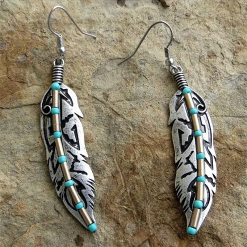 Bohemian Retro Style Inlaid Turquoise Carved Feather Shape Women's Earrings Party Travel Accessories
Bohemian Retro Style Inlaid Turquoise Carved Feather Shape Women's Earrings Party Travel Accessories