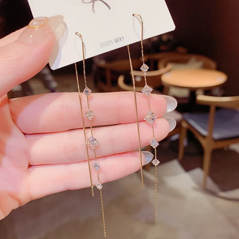 New fashion jewelry design Korean square zircon tassel anti-lost ear line net celebrity personality face thin earrings for women
New fashion jewelry design Korean square zircon tassel anti-lost ear line net celebrity personality face thin earrings for women