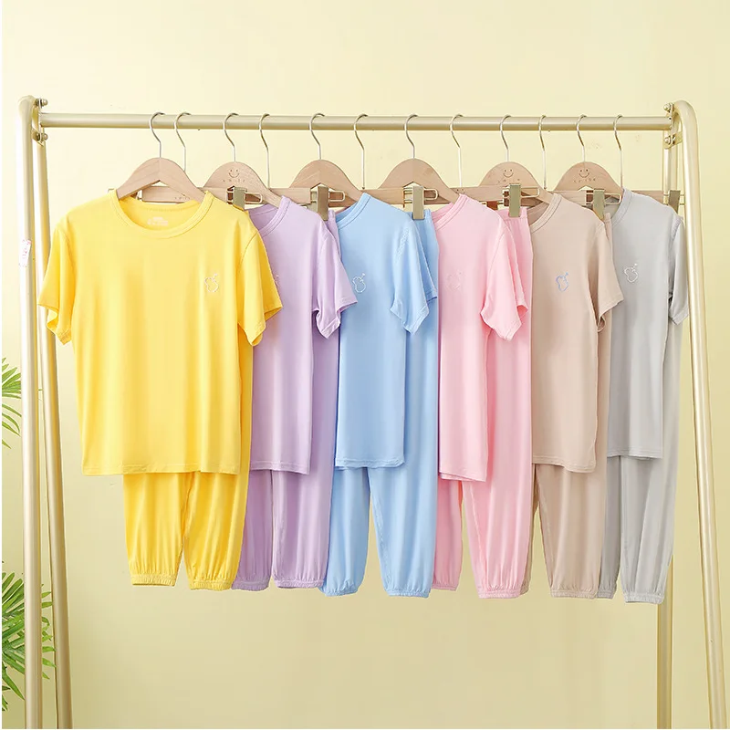 Kids Pajamas Sets Summer Thin Girl Homewear Sleepwear Modal Short Sleeve Trousers Air Conditioning Nightgown Solid Boy Clothes
Kids Pajamas Sets Summer Thin Girl Homewear Sleepwear Modal Short Sleeve Trousers Air Conditioning Nightgown Solid Boy Clothes