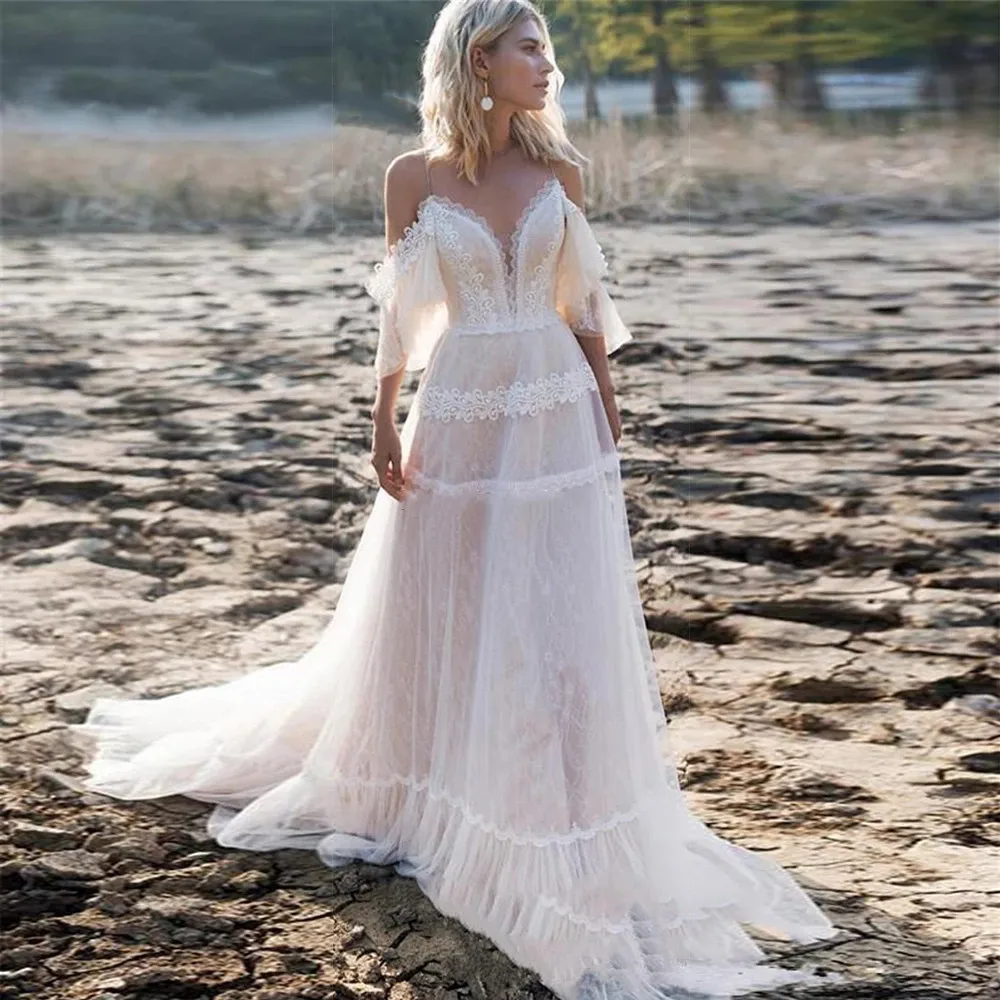 2021 Bohemian Wedding Dresses Off Shoulder A Line Spaghetti Straps Lace Applique Wedding Gowns Backless Beach Bridal Dress
2021 Bohemian Wedding Dresses Off Shoulder A Line Spaghetti Straps Lace Applique Wedding Gowns Backless Beach Bridal Dress
