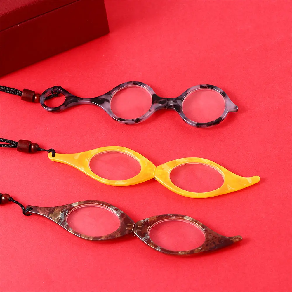 1Pc New Portable Fashion Reading Glasses Pendant Foldable Circular Gift For Parents Hanging Neck Mini Elderly Presbyopic Glasses
1Pc New Portable Fashion Reading Glasses Pendant Foldable Circular Gift For Parents Hanging Neck Mini Elderly Presbyopic Glasses
