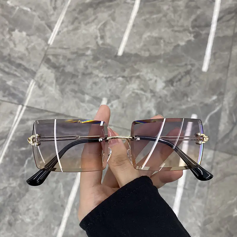 Stylish Retro Sunglasses for Women Rimless Frameless Rectangle Shades Gradient UV400 Summer Traveling Sun Glasses 2022 Outdoor
Stylish Retro Sunglasses for Women Rimless Frameless Rectangle Shades Gradient UV400 Summer Traveling Sun Glasses 2022 Outdoor