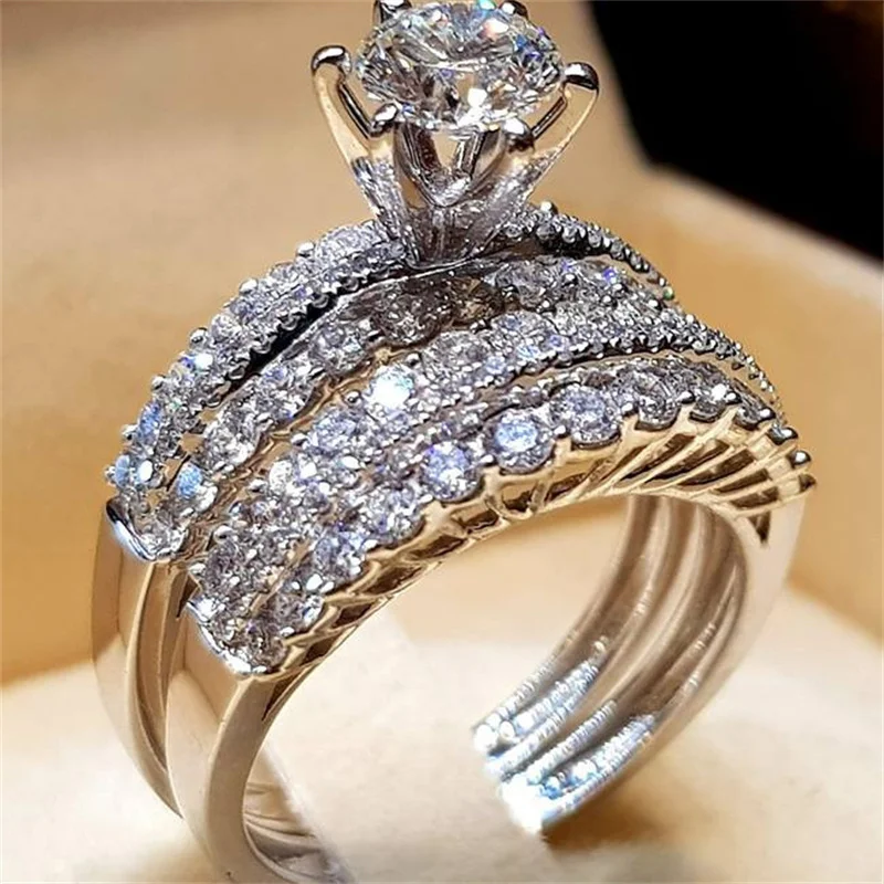 Qualities Fashion Silver Colors Rings for Women Set Trendy Metal Inlaid White Stone Wedding Engagement Jewelry
Qualities Fashion Silver Colors Rings for Women Set Trendy Metal Inlaid White Stone Wedding Engagement Jewelry