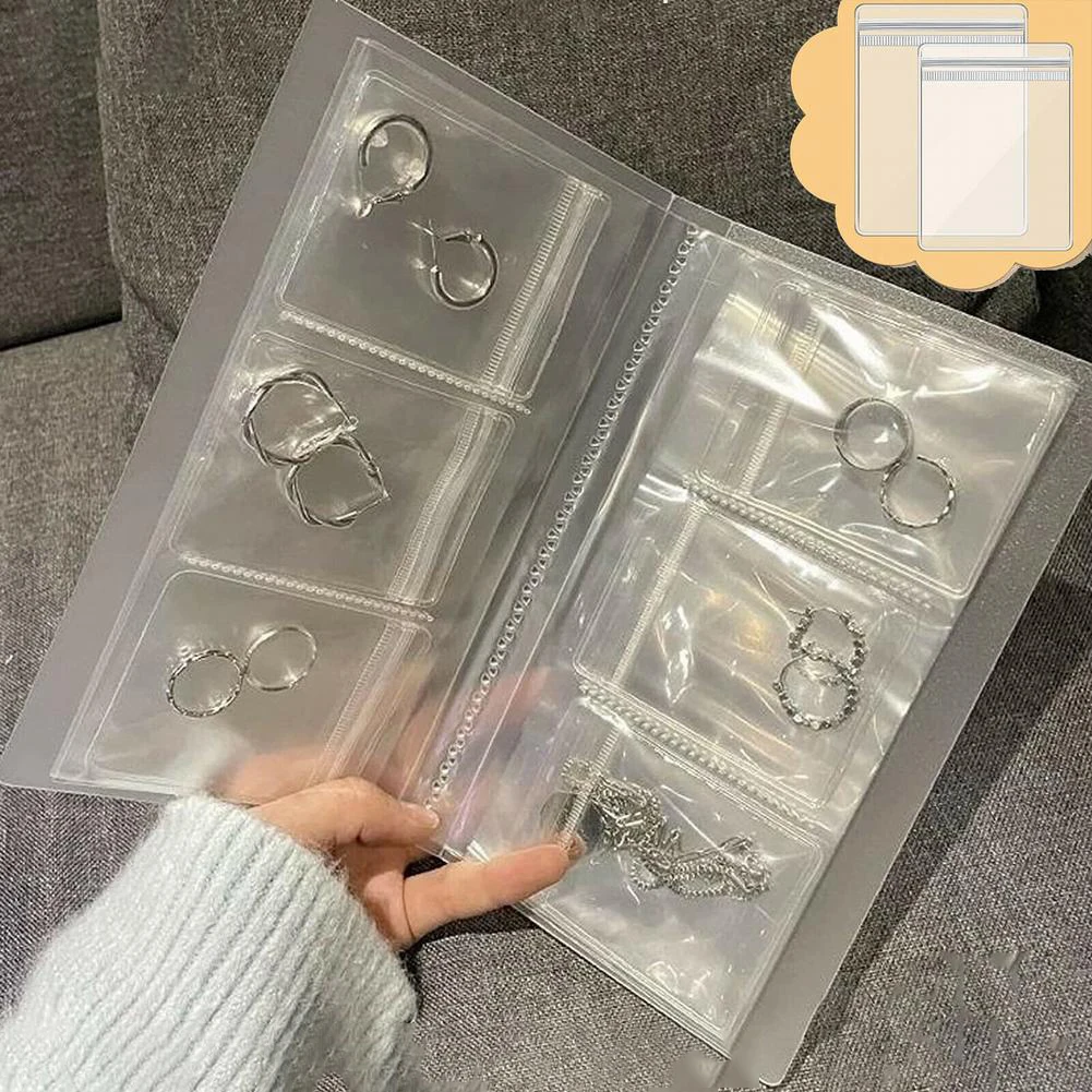 31x Transparent Jewelry Storage Book Small Plastic Gifts Reclosable Bag Bead Buttons Souvenir Coins Undertake Inductive
31x Transparent Jewelry Storage Book Small Plastic Gifts Reclosable Bag Bead Buttons Souvenir Coins Undertake Inductive