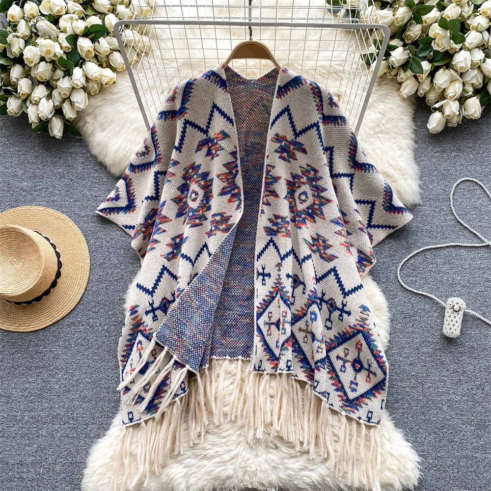 Clothland Women Vintage Print Knitting Cape Shawl Open Stitch Tassels Three Quarter Sleeve Loose Jacket Retro Fashion Coat CA834
Clothland Women Vintage Print Knitting Cape Shawl Open Stitch Tassels Three Quarter Sleeve Loose Jacket Retro Fashion Coat CA834