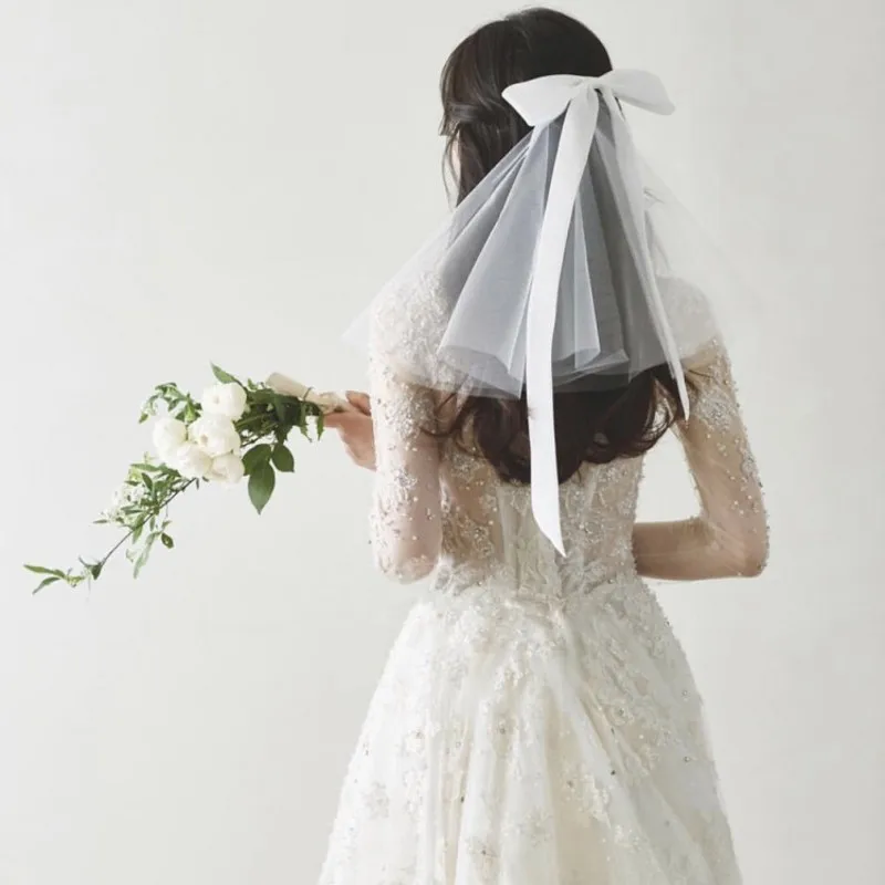 Charming Headdress Decorated With A Large Bow Two-Layer Mesh Veil Handmade Length Can Be Customized Wedding Accessories TT375
Charming Headdress Decorated With A Large Bow Two-Layer Mesh Veil Handmade Length Can Be Customized Wedding Accessories TT375