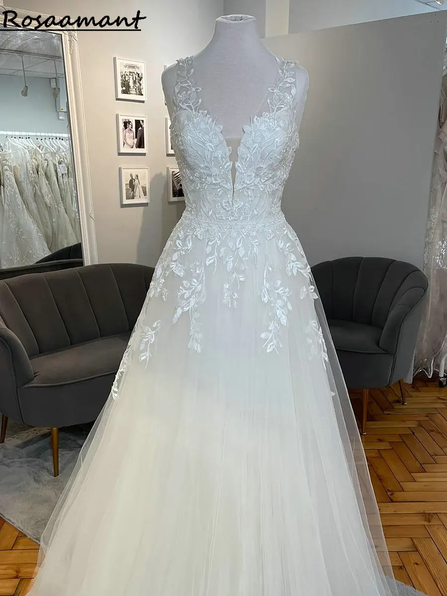 Real Image Deep V-Neck Illusion Wedding Dresses A-Line Open Back Appliques Lace Bridal Gowns
Real Image Deep V-Neck Illusion Wedding Dresses A-Line Open Back Appliques Lace Bridal Gowns