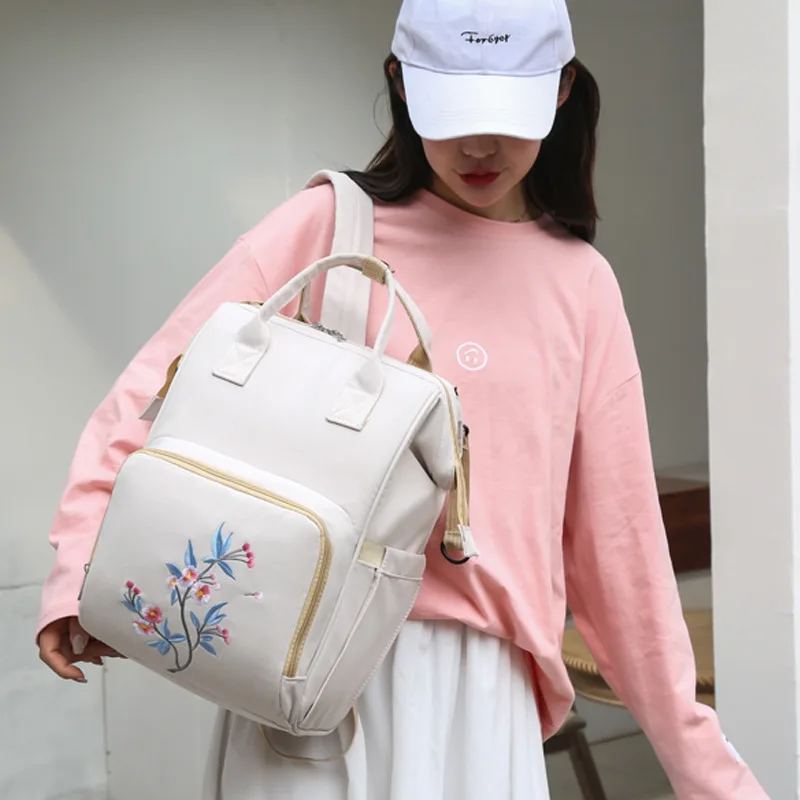 Large Capacity Ladies Mom Bag Waterproof Baby Care Backpack Flower Embroidered Ladies Backpack Outdoor Travel Baby Diaper Bag
Large Capacity Ladies Mom Bag Waterproof Baby Care Backpack Flower Embroidered Ladies Backpack Outdoor Travel Baby Diaper Bag