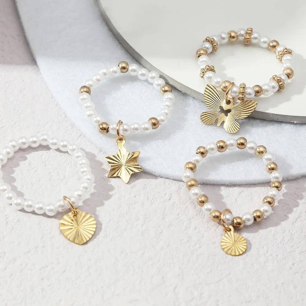 4pcs Temperament Pearl Elastic Tail Rings Simple Colorful Rice Beads Butterfly Heart Star Pendant Rings For Women
4pcs Temperament Pearl Elastic Tail Rings Simple Colorful Rice Beads Butterfly Heart Star Pendant Rings For Women