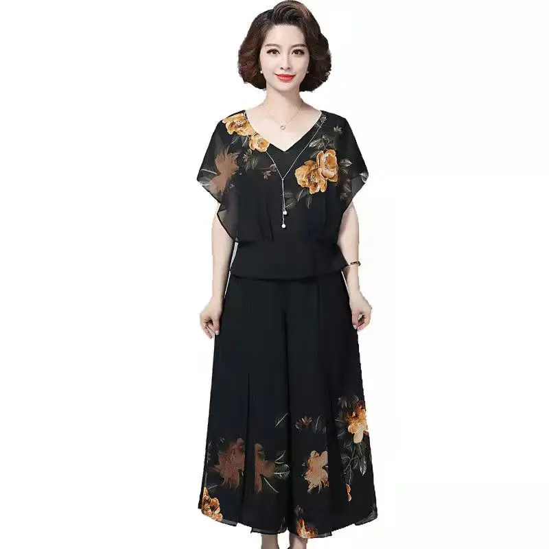 Women's Floral Printed Two Pieces Suits Set Short- Sleeved top with Pants 2022 Summer Chiffon Fashion 2 piece set W229
Women's Floral Printed Two Pieces Suits Set Short- Sleeved top with Pants 2022 Summer Chiffon Fashion 2 piece set W229
