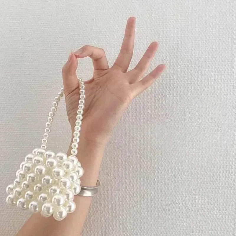 Pearl Handbag For Women Luxury Designer Mini Cross Shoulder Bag Handbag Females Tiny Lipstick Bag Coin Purse
Pearl Handbag For Women Luxury Designer Mini Cross Shoulder Bag Handbag Females Tiny Lipstick Bag Coin Purse