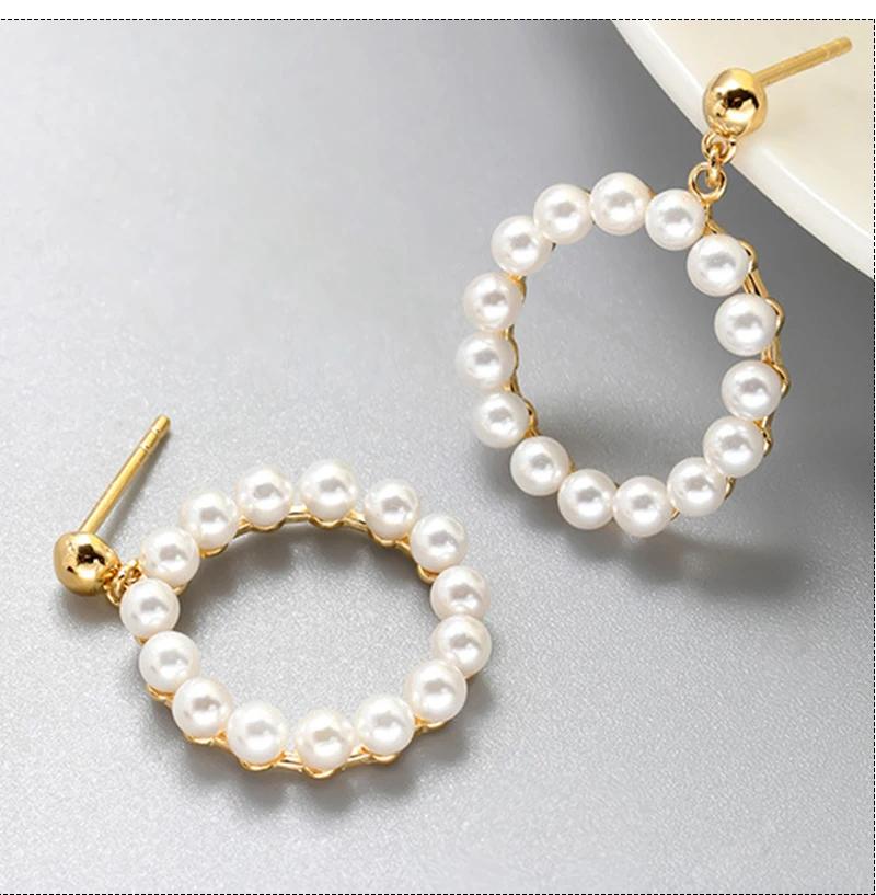S925 Pure Silver Ear Nail Female Pearl Inlaid Circle Spring Earrings New Minority Design Advanced Sense Earring Are Not Allergic
S925 Pure Silver Ear Nail Female Pearl Inlaid Circle Spring Earrings New Minority Design Advanced Sense Earring Are Not Allergic