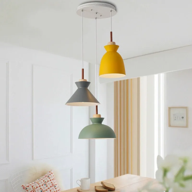 Nordic modern minimalist three-headed dining room lamp macaroon chandelier creative bar dining room table lamp.
Nordic modern minimalist three-headed dining room lamp macaroon chandelier creative bar dining room table lamp.
