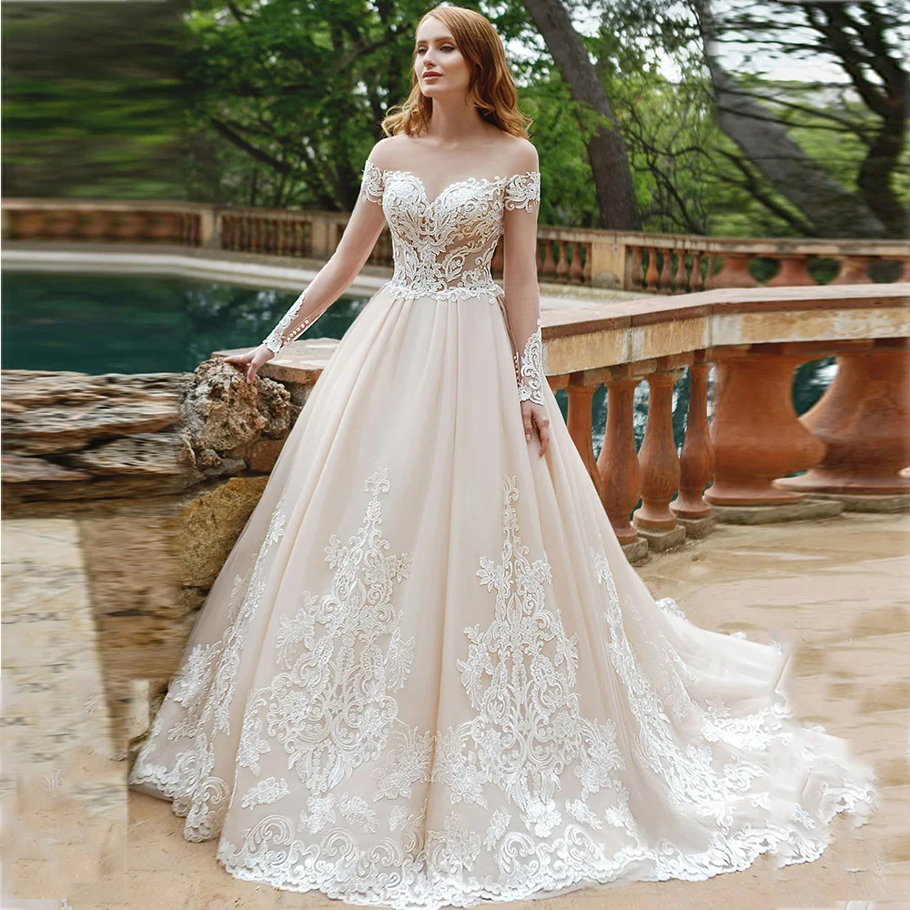 Luxury Ivory Wedding Dresses V-Neck Long Sleeves Tulle Dress Appliques Lace A-Line Sweep Train Button Bridal Gowns 2022 Vestidos
Luxury Ivory Wedding Dresses V-Neck Long Sleeves Tulle Dress Appliques Lace A-Line Sweep Train Button Bridal Gowns 2022 Vestidos
