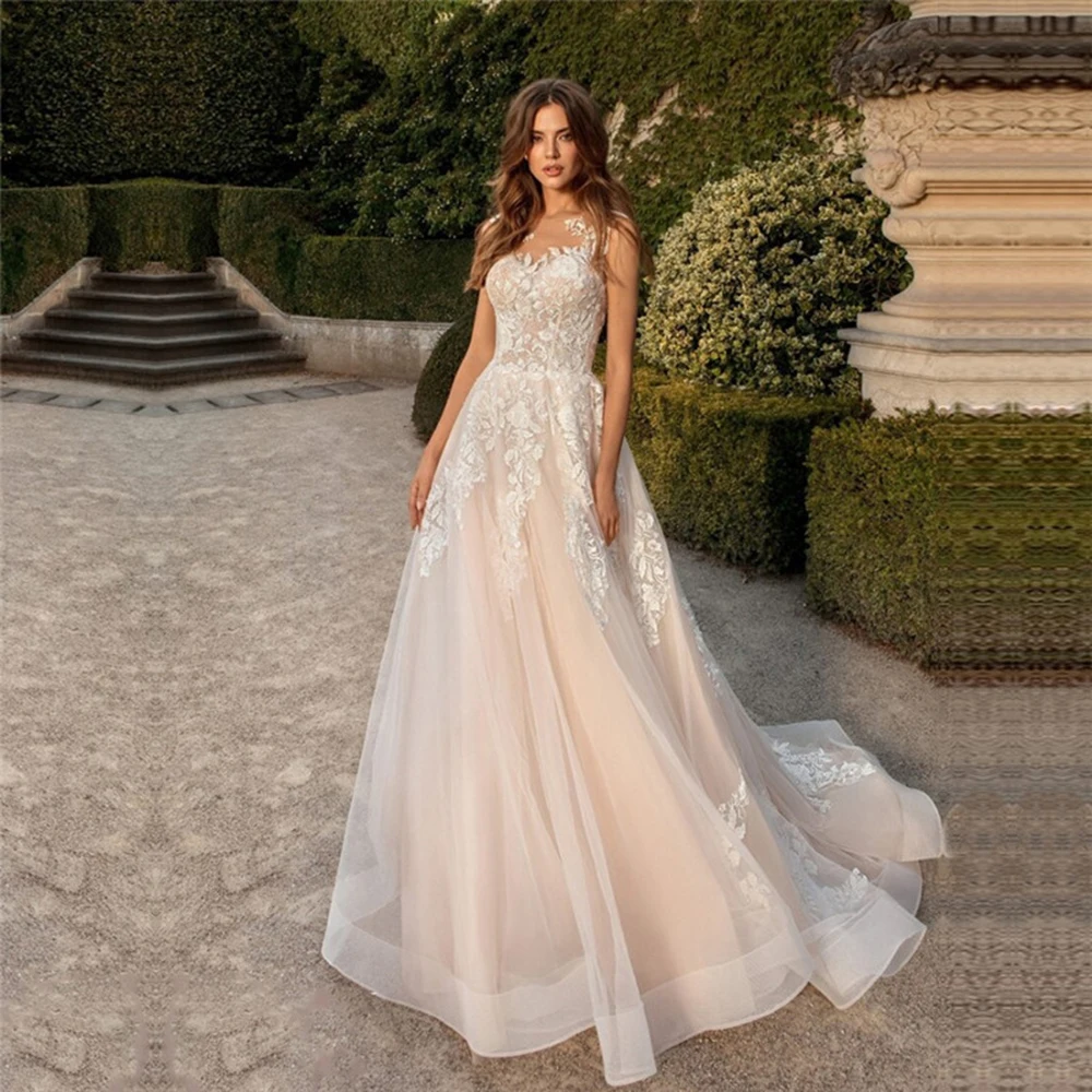 Elegant O Neck A Line 2022 Bohemian Wedding Dresses Backless Tulle With Appliques Sweep Train Sleeveless Bridal Gowns Customized
Elegant O Neck A Line 2022 Bohemian Wedding Dresses Backless Tulle With Appliques Sweep Train Sleeveless Bridal Gowns Customized