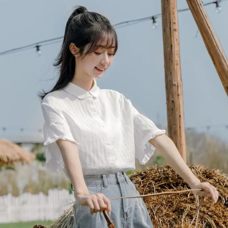 2022 Summer White Shirt Women's Ruffle Top Design Sense Japanese Temperament Short-sleeved Fashion Commuter Women's Top Quality
2022 Summer White Shirt Women's Ruffle Top Design Sense Japanese Temperament Short-sleeved Fashion Commuter Women's Top Quality