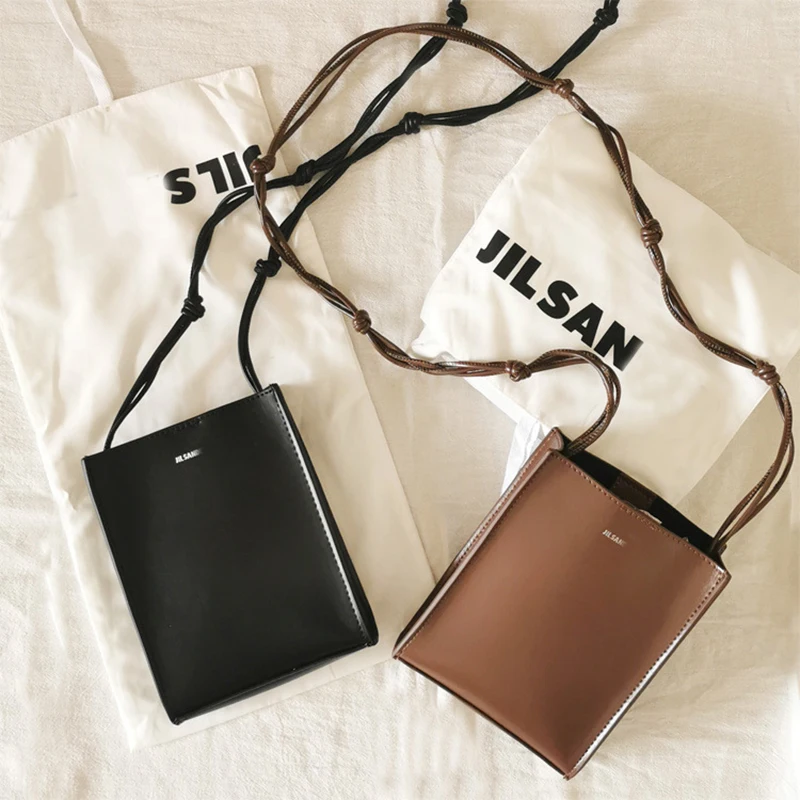 2022 Niche Design Shoulder Bag Spring And Summer Woven Shoulder Strap Solid Color Small Square Bag Simple Trend Messenger Bag
2022 Niche Design Shoulder Bag Spring And Summer Woven Shoulder Strap Solid Color Small Square Bag Simple Trend Messenger Bag