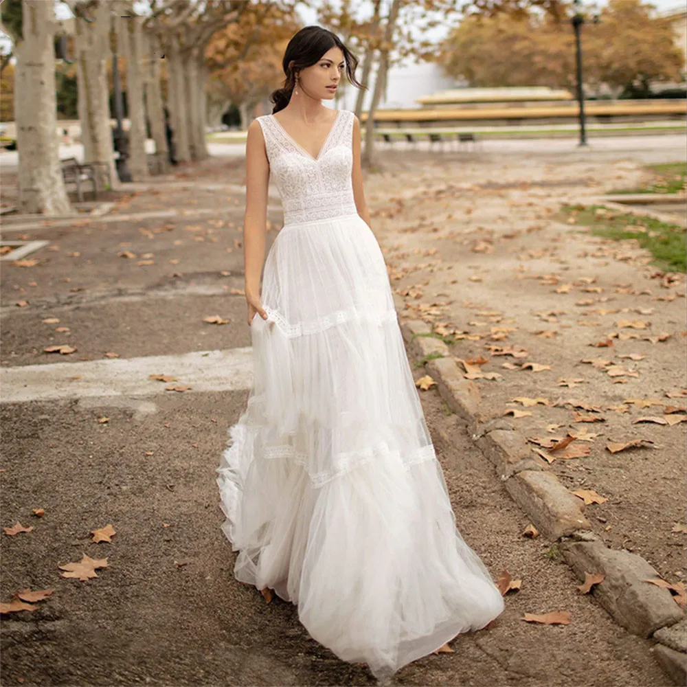 Simple A Line Wedding Dresses With Lace Appliques V Neck Tulle Sleeveless Backless Sweep Train Bridal Gowns Elegant For Bride
Simple A Line Wedding Dresses With Lace Appliques V Neck Tulle Sleeveless Backless Sweep Train Bridal Gowns Elegant For Bride