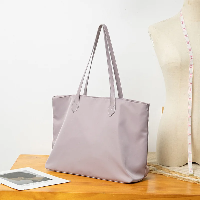 2022 Women New Fashion Large Capacity Elegant Tote Bag Concise Shoulder Bag Sewing Thread Oxford Handbag Office Daily
2022 Women New Fashion Large Capacity Elegant Tote Bag Concise Shoulder Bag Sewing Thread Oxford Handbag Office Daily