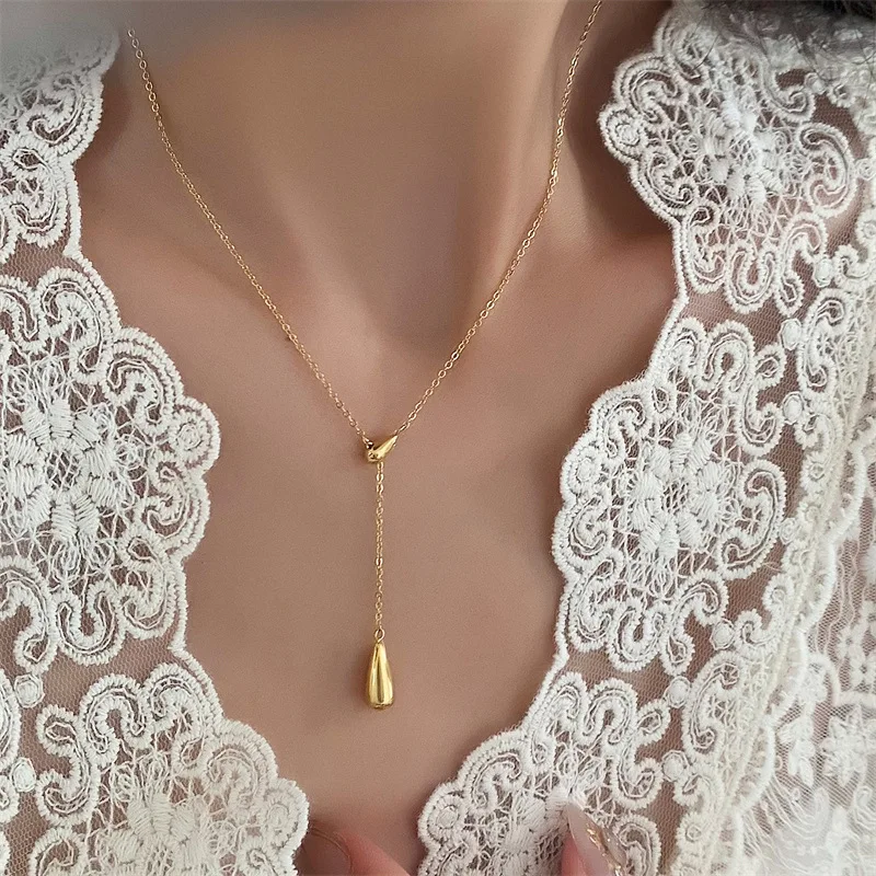 Simple Fashion 18k Gilded Tassel Double Water Drop Necklace Glossy Collarbone Chain Titanium Steel Necklace
Simple Fashion 18k Gilded Tassel Double Water Drop Necklace Glossy Collarbone Chain Titanium Steel Necklace