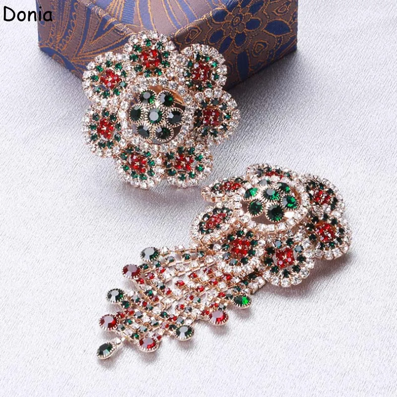 Donia jewelry Luxurious winter fashion tassel full drill hollow flower brooch exaggerated atmospheric claw chain accessories
Donia jewelry Luxurious winter fashion tassel full drill hollow flower brooch exaggerated atmospheric claw chain accessories