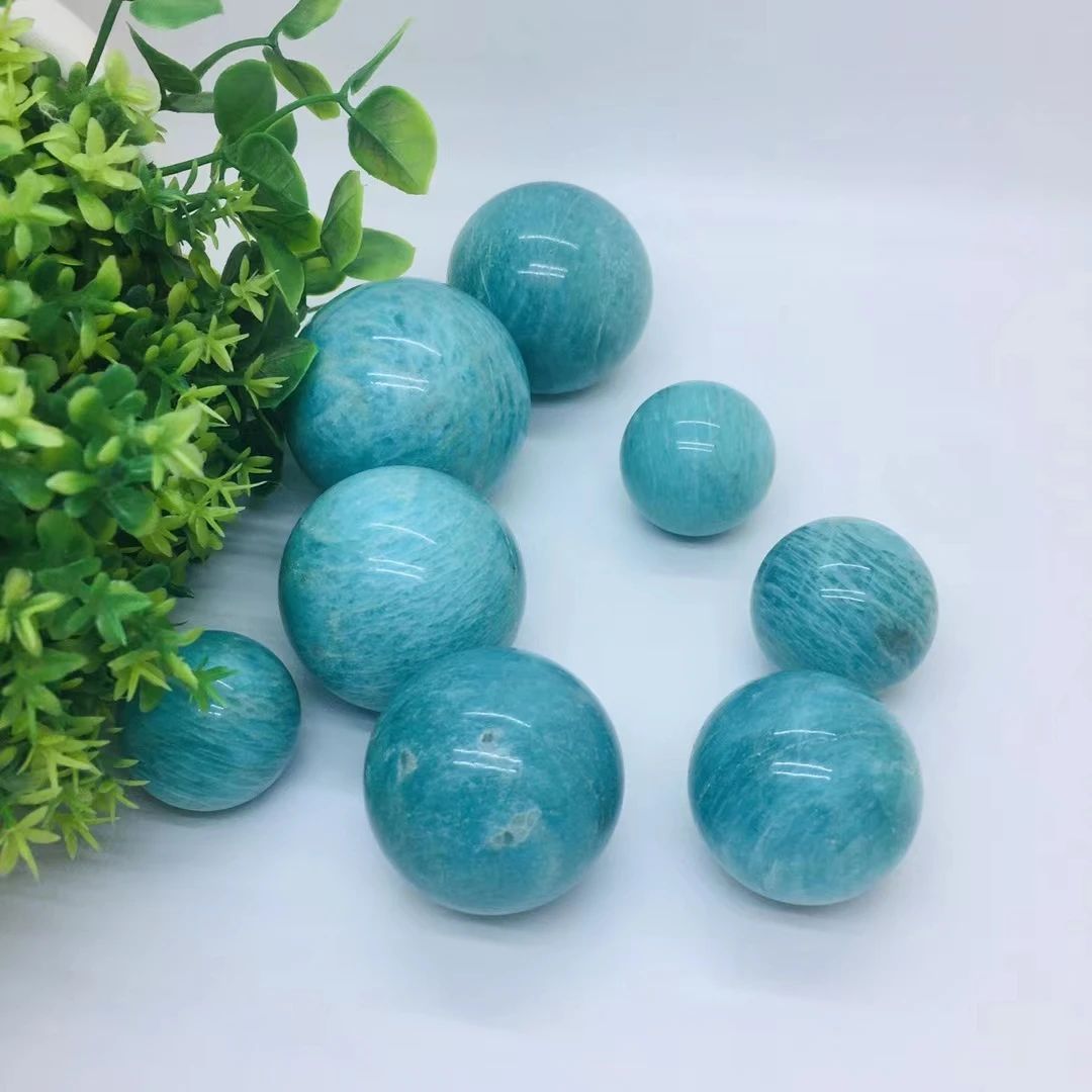 100mm 100% Natural amazon stone crystal Quartz sphere amazonite Ball Rock Mineral gift wooden base Reiki healing Home decor 1pcs
100mm 100% Natural amazon stone crystal Quartz sphere amazonite Ball Rock Mineral gift wooden base Reiki healing Home decor 1pcs