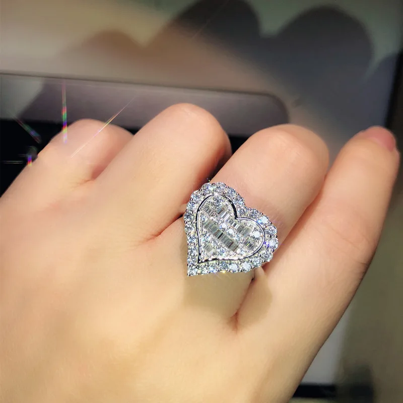 S925 silver new full love ring diamond ring inlaid with mosan diamond heart-shaped index finger engagement ring
S925 silver new full love ring diamond ring inlaid with mosan diamond heart-shaped index finger engagement ring