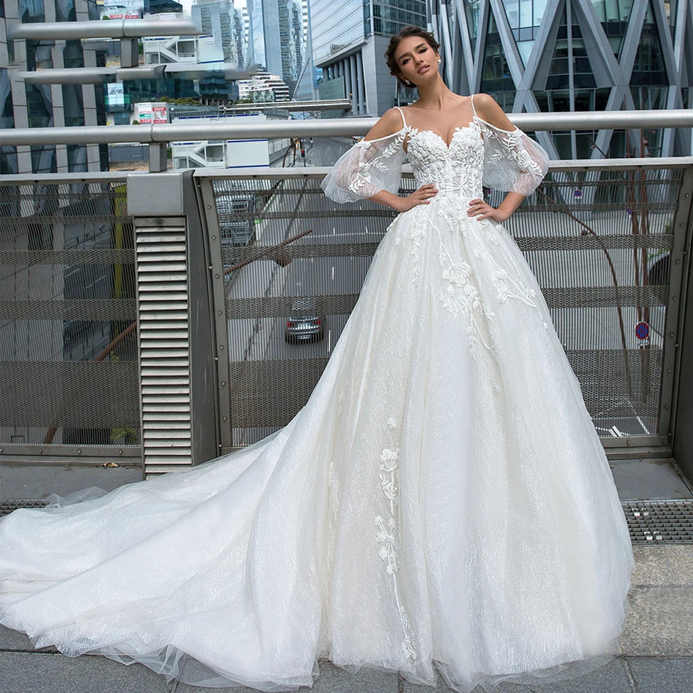 Roseca Ye A-Line Wedding Dress 2023 Spaghetti Straps Appliques Backless Bride Glitter Boho Bridal Gowns Short Sleeves Ivory
Roseca Ye A-Line Wedding Dress 2023 Spaghetti Straps Appliques Backless Bride Glitter Boho Bridal Gowns Short Sleeves Ivory