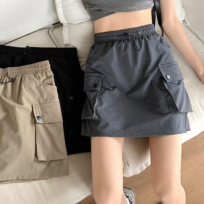 Women Cargo Solid Skirts Spring Summer Drawstring Elastic Waist Y2K Skirts Girls Harajuku Streetwear Casual Pocket Mini Skirt
Women Cargo Solid Skirts Spring Summer Drawstring Elastic Waist Y2K Skirts Girls Harajuku Streetwear Casual Pocket Mini Skirt