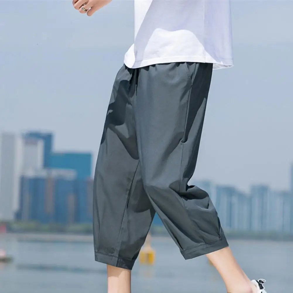 Summer Men's Shorts Pants Solid Color Elastic Waist Drawstring Loose Casual Pockets Capri Pants Cropped Pants
Summer Men's Shorts Pants Solid Color Elastic Waist Drawstring Loose Casual Pockets Capri Pants Cropped Pants