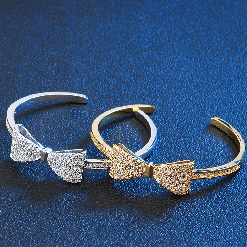 Micro Pave Cubic Zirconia Elegant Temperament Bowknot Bracelet for Women Brand Design Fashion Statement Wedding Jewelry
Micro Pave Cubic Zirconia Elegant Temperament Bowknot Bracelet for Women Brand Design Fashion Statement Wedding Jewelry