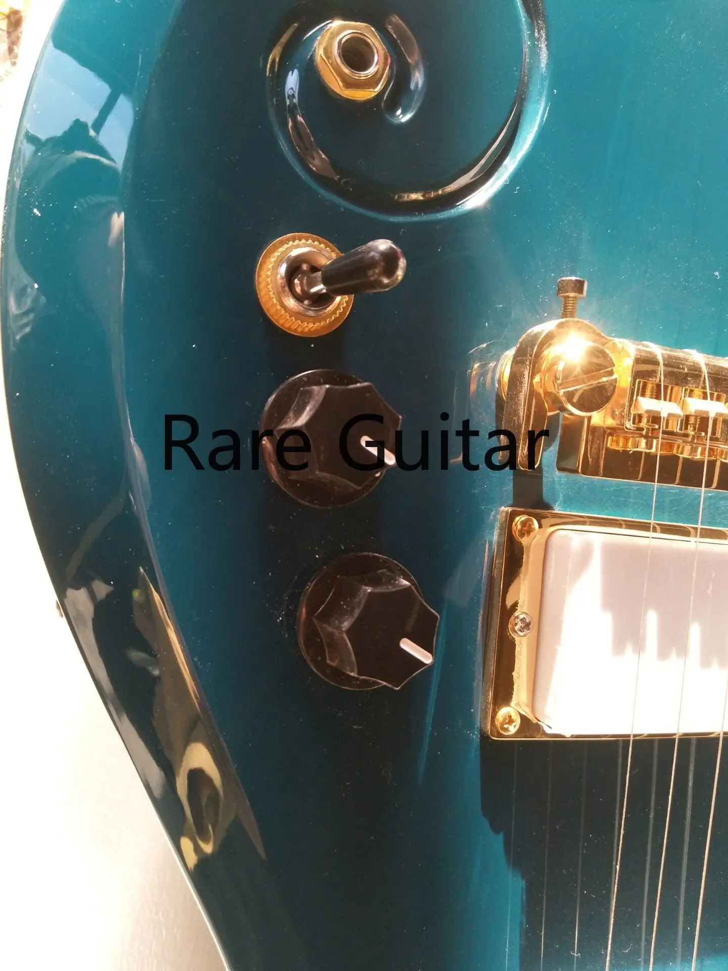 

Rhxflame Rare Diamond Series Prince Cloud Tea Blue Guitar Alder Body, Maple Neck, Love Symbol Inlay, Gold Humbucker Pickup