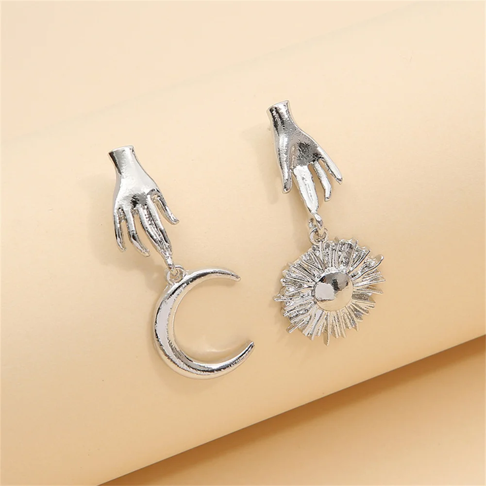 European And American Creative Fun Metal Palm Sun Moon Earrings Personality Asymmetry Exaggerated Fashion Earrings For Women
European And American Creative Fun Metal Palm Sun Moon Earrings Personality Asymmetry Exaggerated Fashion Earrings For Women