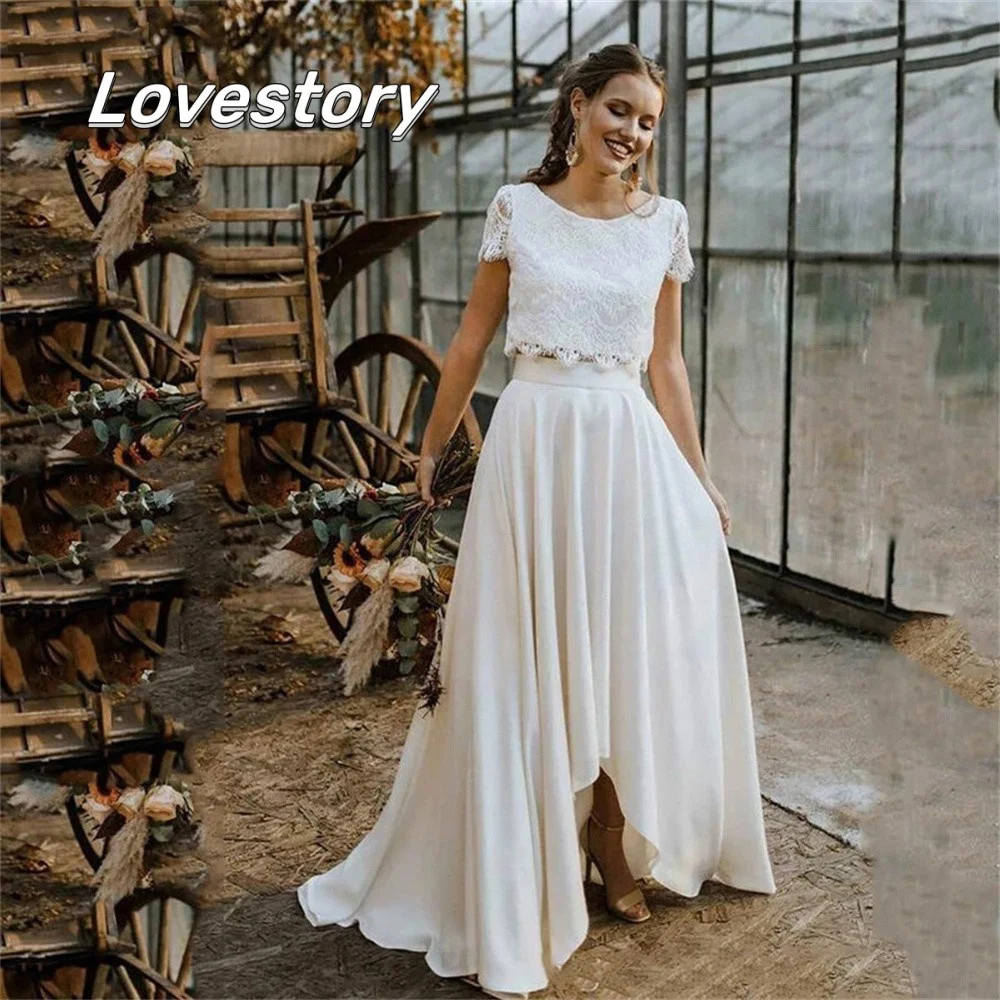 New Boho Wedding Dresses 2 Pieces High Low Lace Appliques Bridal Gown Scoop Neck Short Sleeves Vestidos De Noiva Button Illusion
New Boho Wedding Dresses 2 Pieces High Low Lace Appliques Bridal Gown Scoop Neck Short Sleeves Vestidos De Noiva Button Illusion