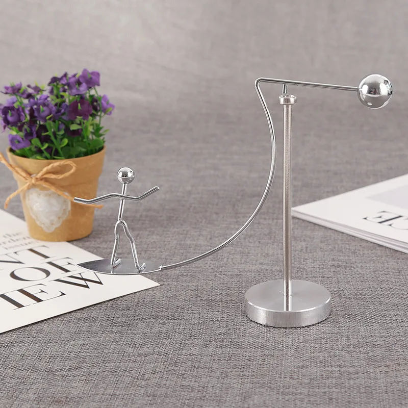 Stainless Steel Newton Pendulum Gifts Perpetual Motion Newton's Cradle Tumbler Balance Little Iron Surfer Skier Home Ornaments
Stainless Steel Newton Pendulum Gifts Perpetual Motion Newton's Cradle Tumbler Balance Little Iron Surfer Skier Home Ornaments