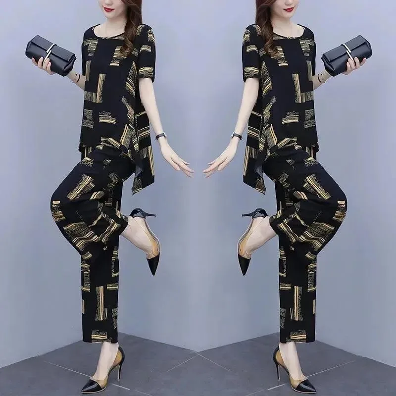 2022 New Summer Short Sleeve Women's Sets Clothes Mom Western Casual Fashion Thin Wide-Leg Pants Two Piece Set Female 4XL H2203
2022 New Summer Short Sleeve Women's Sets Clothes Mom Western Casual Fashion Thin Wide-Leg Pants Two Piece Set Female 4XL H2203