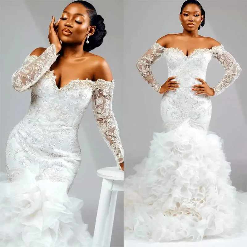 

Customers Often Bought With Compare with similar Items 2022 Gorgeous Mermaid Wedding Dresses Off the Shoulder Long Sleeves