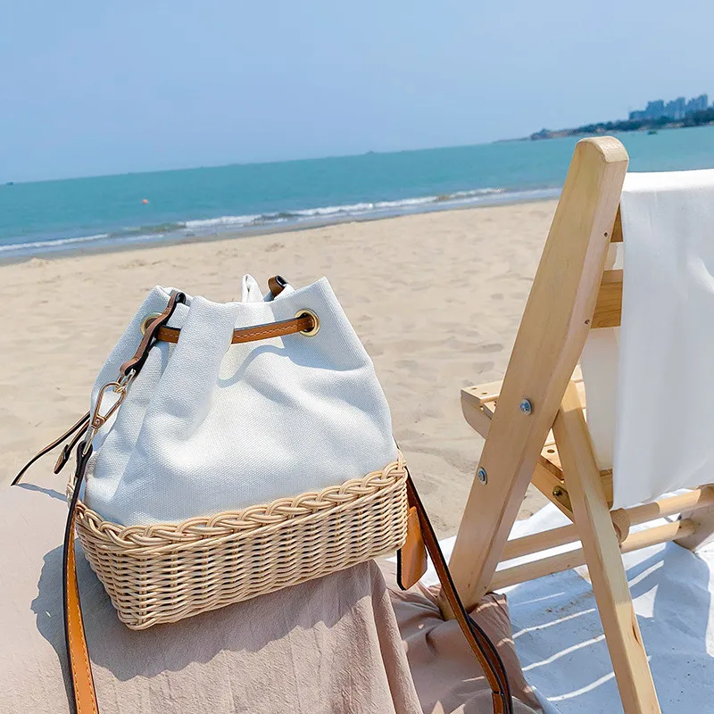 FIRMRANCH Fresh Hand-Woven Rattan Milkshake White Canvas Large-Capacity Drawstring Portable Bucket Female Beach Crossbody Bag
FIRMRANCH Fresh Hand-Woven Rattan Milkshake White Canvas Large-Capacity Drawstring Portable Bucket Female Beach Crossbody Bag