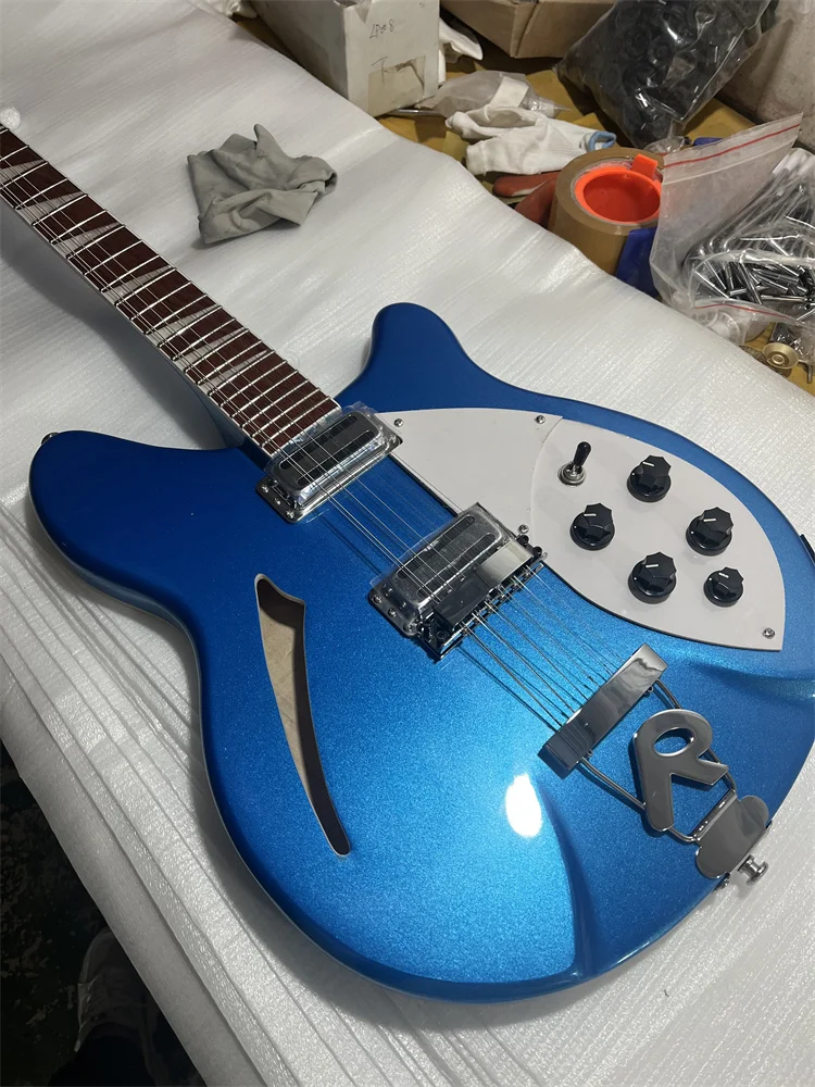 high-quality 6-string electric guitar, Ricken electric guitar,Metal blue colour rosewood fingerboard, free shipping.
high-quality 6-string electric guitar, Ricken electric guitar,Metal blue colour rosewood fingerboard, free shipping.