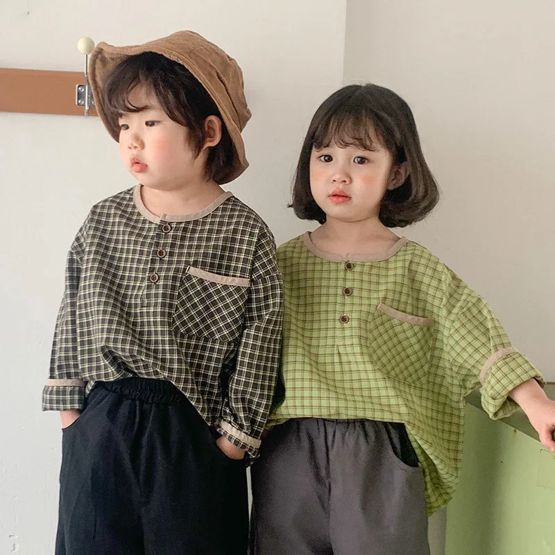 Blouses Korean Style Children Casual Plaid Shirts Camisa Xadrez Boys and Girls Cotton Loose Tops T Shirts Blusa Infantil Hemden
Blouses Korean Style Children Casual Plaid Shirts Camisa Xadrez Boys and Girls Cotton Loose Tops T Shirts Blusa Infantil Hemden