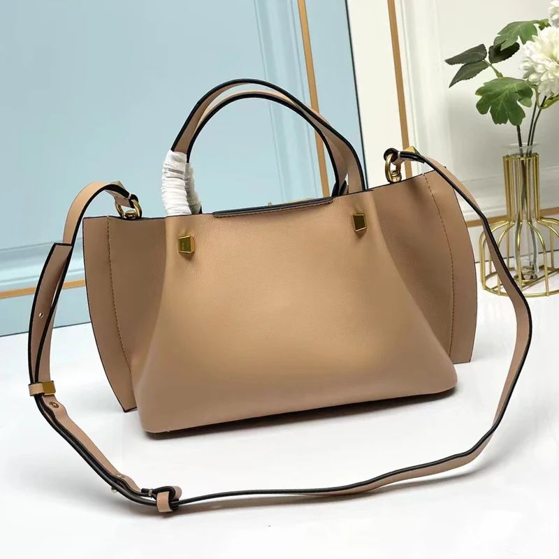 Vintage leather micro-standard trim large capacity handbag Women's new Tote bag Fashion multi-functional diagonal shoulder bag
Vintage leather micro-standard trim large capacity handbag Women's new Tote bag Fashion multi-functional diagonal shoulder bag