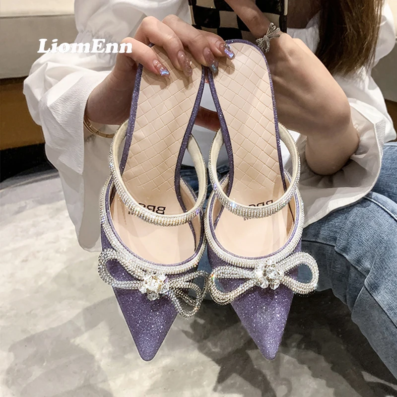 Luxury Brand Crystal Bowknot Thin Heels Mules Women Sexy Bling Pointed Toe Summer Slippers Women Sandals Outdoor Party Shoe 2022
Luxury Brand Crystal Bowknot Thin Heels Mules Women Sexy Bling Pointed Toe Summer Slippers Women Sandals Outdoor Party Shoe 2022