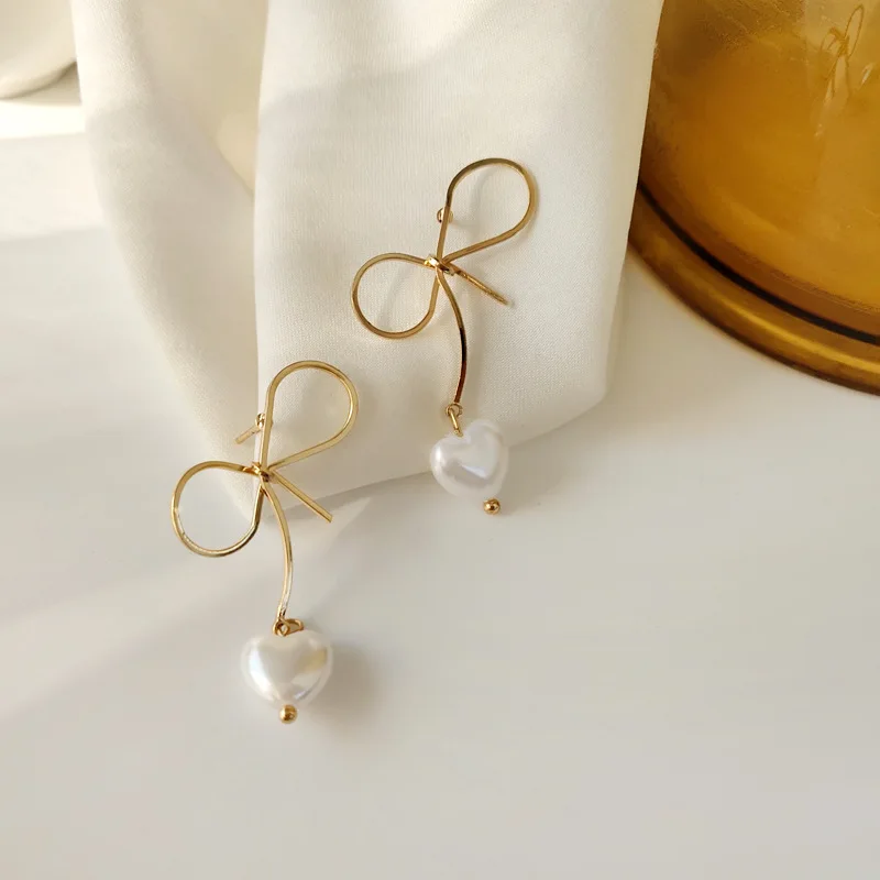 Fashion Cute Bow Stud Earrings Ladies Pearl Pendant Earrings Korean Style Tassel Long Earrings Party Jewelry Gift Accessories
Fashion Cute Bow Stud Earrings Ladies Pearl Pendant Earrings Korean Style Tassel Long Earrings Party Jewelry Gift Accessories